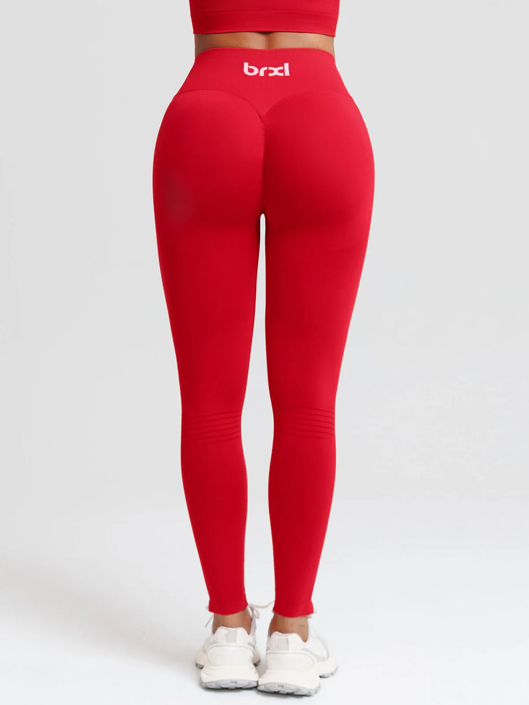 A model wearing a BRXL® BrxlZero® Seamless Butt Lifting Workout Leggings with Calf Support
