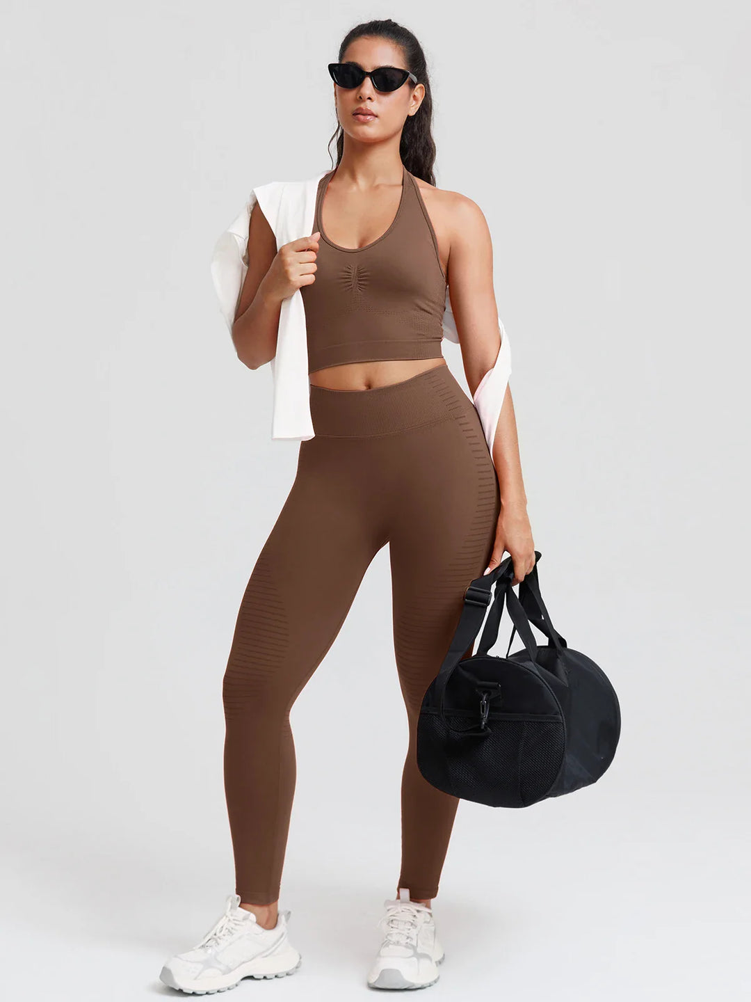 A model wearing a BRXL® BrxlZero® Seamless Butt Lifting Workout Leggings with Calf Support