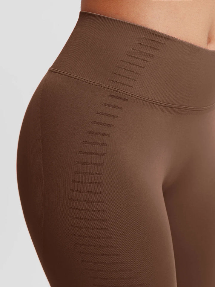 A model wearing a BRXL® BrxlZero® Seamless Butt Lifting Workout Leggings with Calf Support