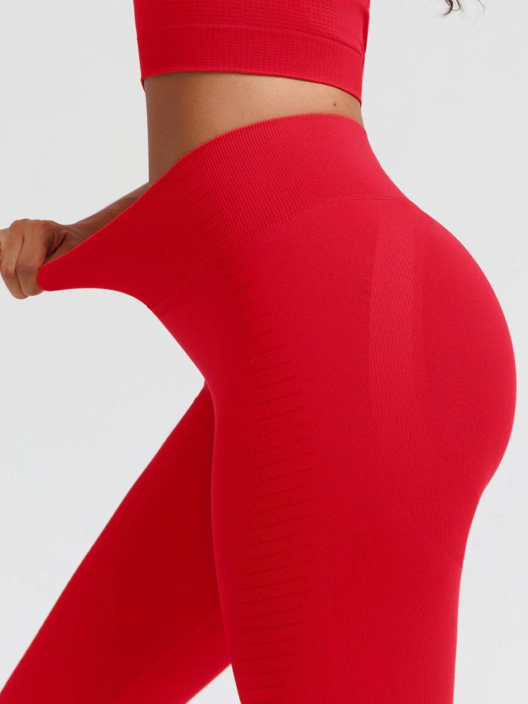 A model wearing a BRXL® BrxlZero® Seamless Butt Lifting Workout Leggings with Calf Support