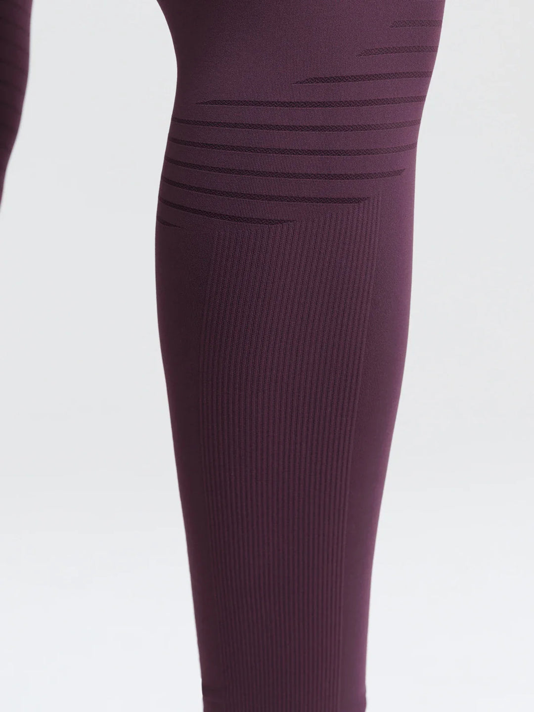 A model wearing a BRXL® BrxlZero® Seamless Butt Lifting Workout Leggings with Calf Support