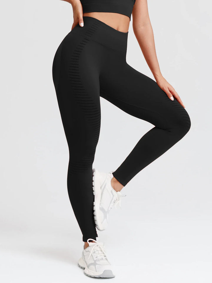 A model wearing a BRXL® BrxlZero® Seamless Butt Lifting Workout Leggings with Calf Support