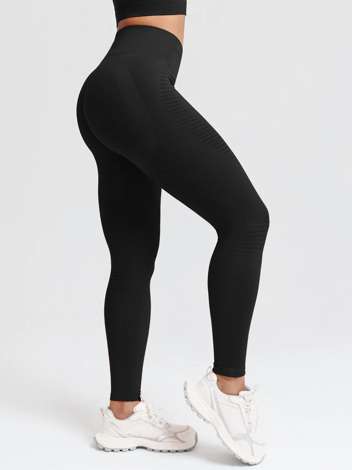 A model wearing a BRXL® BrxlZero® Seamless Butt Lifting Workout Leggings with Calf Support