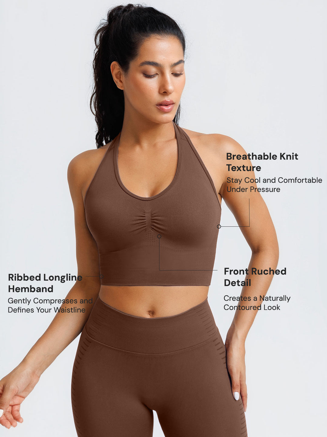 A model wearing a BRXL® BrxlZero® Seamless Ribbed Scoop-Neck Halter Sports Tank Top