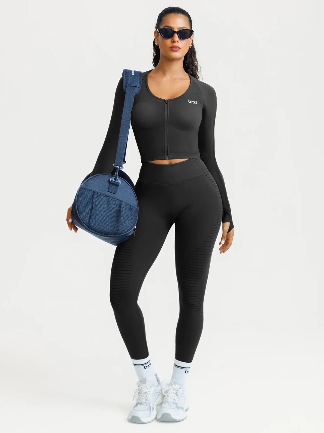A model wearing a BRXL® BrxlZero® Seamless Scoop-Neck Long Sleeve Cropped Jacket