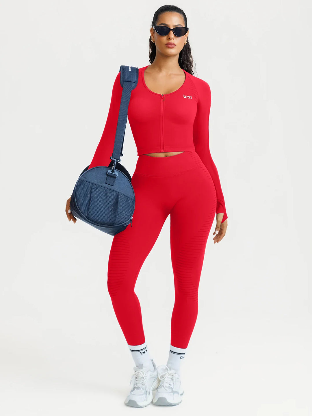 A model wearing a BRXL® BrxlZero® Seamless Scoop-Neck Long Sleeve Cropped Jacket