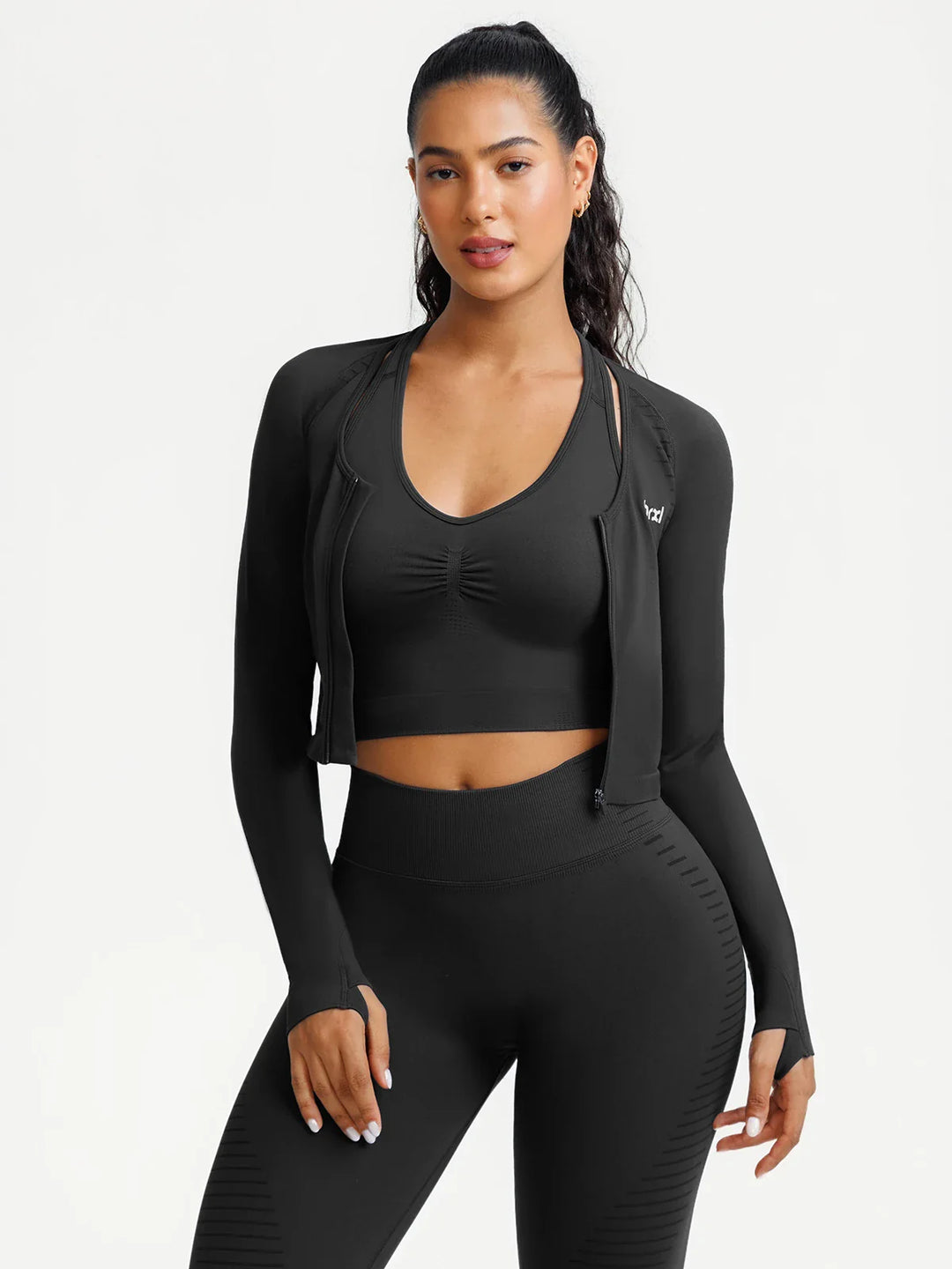 A model wearing a BRXL® BrxlZero® Seamless Scoop-Neck Long Sleeve Cropped Jacket