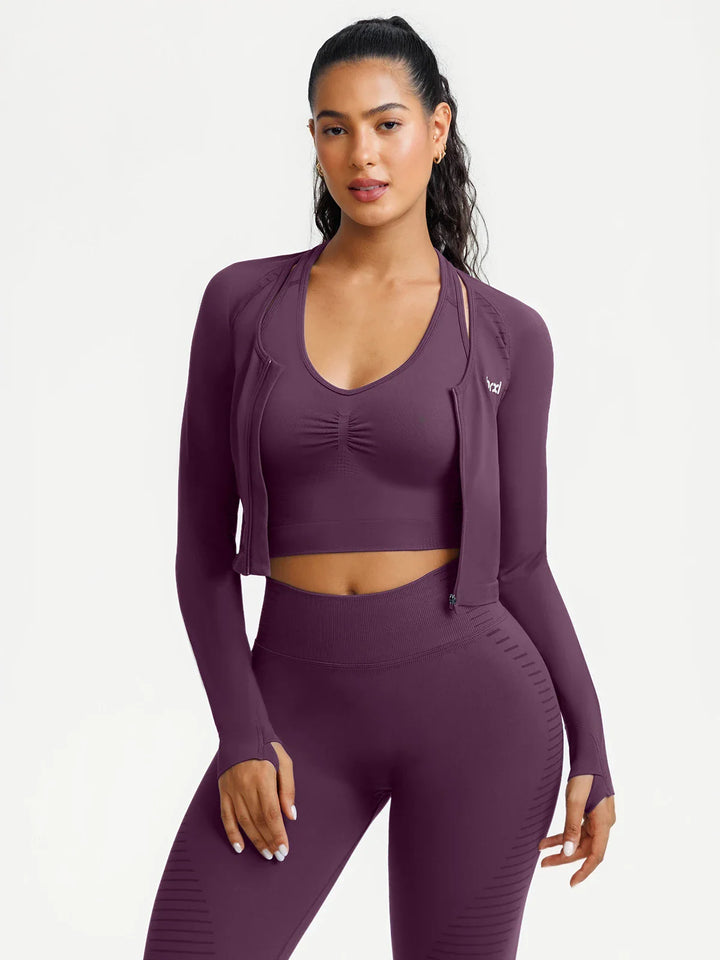 A model wearing a BRXL® BrxlZero® Seamless Scoop-Neck Long Sleeve Cropped Jacket