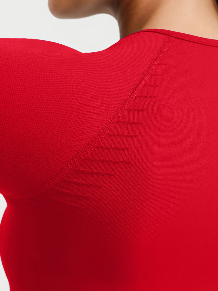 A model wearing a BRXL® BrxlZero® Seamless Scoop-Neck Long Sleeve Cropped Jacket