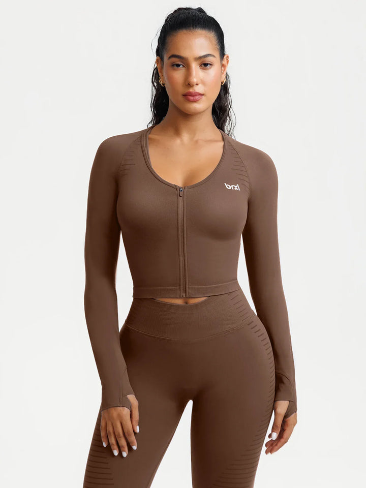 A model wearing a BRXL® BrxlZero® Seamless Scoop-Neck Long Sleeve Cropped Jacket Chocolate Brown / XS
