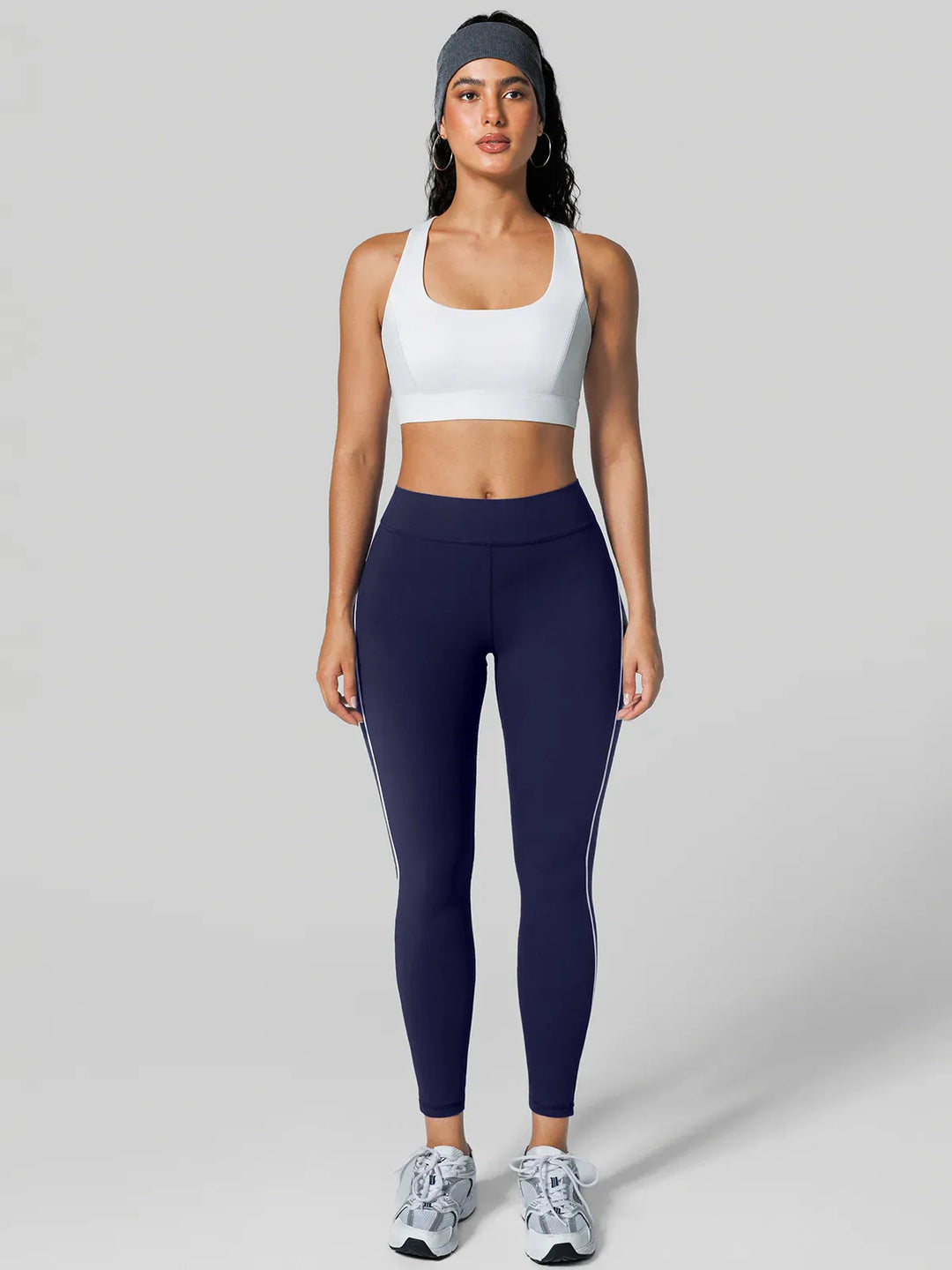 A model wearing a BRXL® Contrast Color Wide Strap Bra Tummy Control Leggings Set Set / White Blue / XS