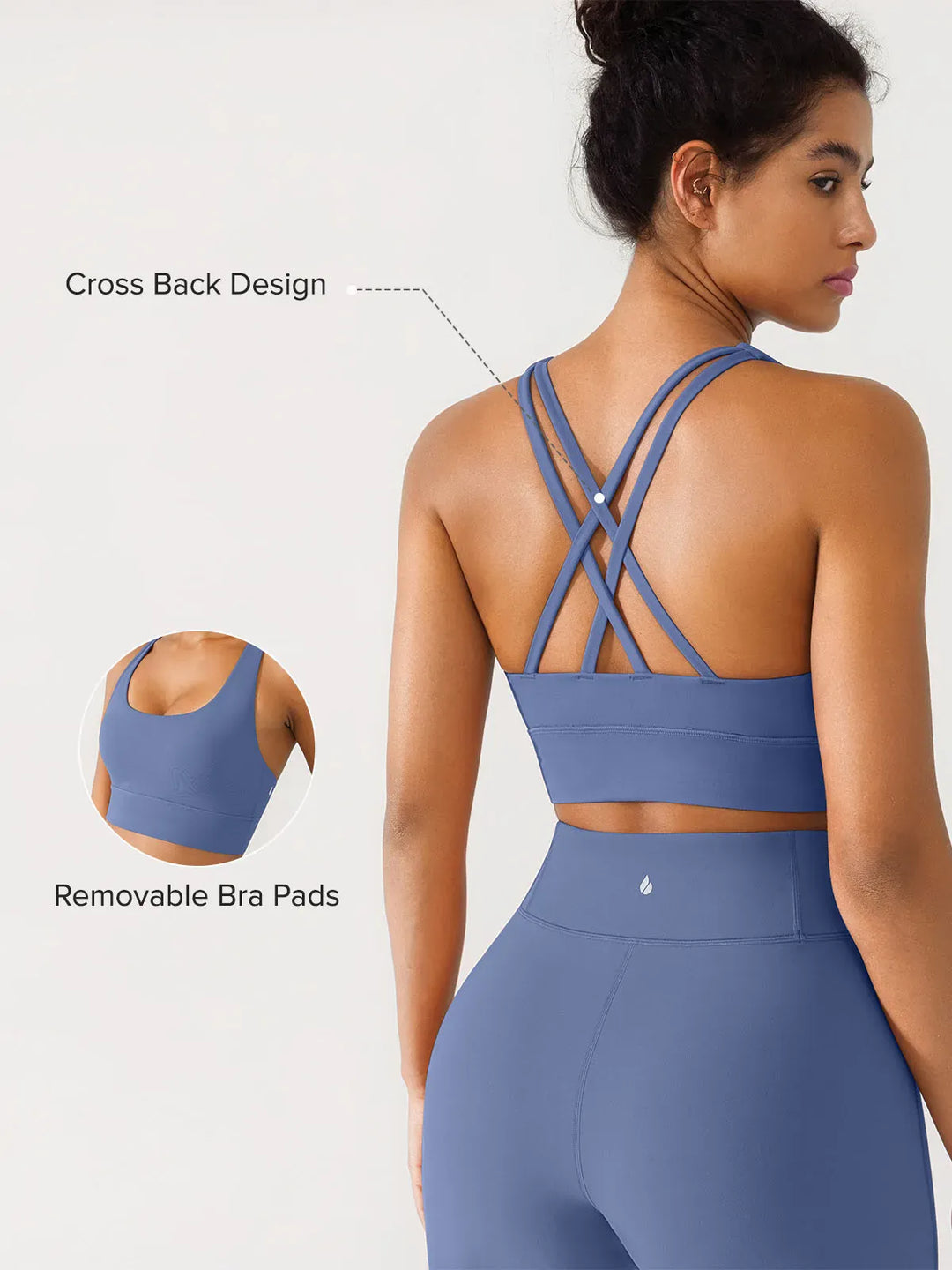 A model wearing a BRXL® Criss Cross Strappy Yoga Sports Bra in