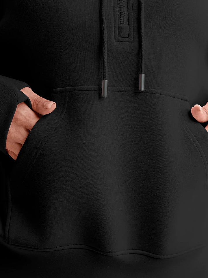 A model wearing a BRXL® Cropped Half-Zip Pullover Comfort Hoodie
