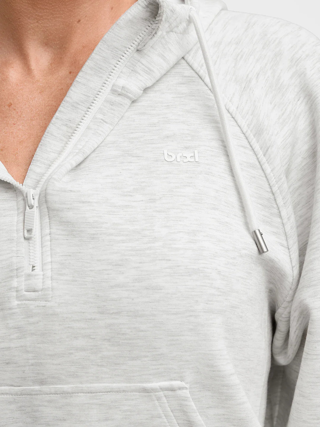 A model wearing a BRXL® Cropped Half-Zip Pullover Comfort Hoodie