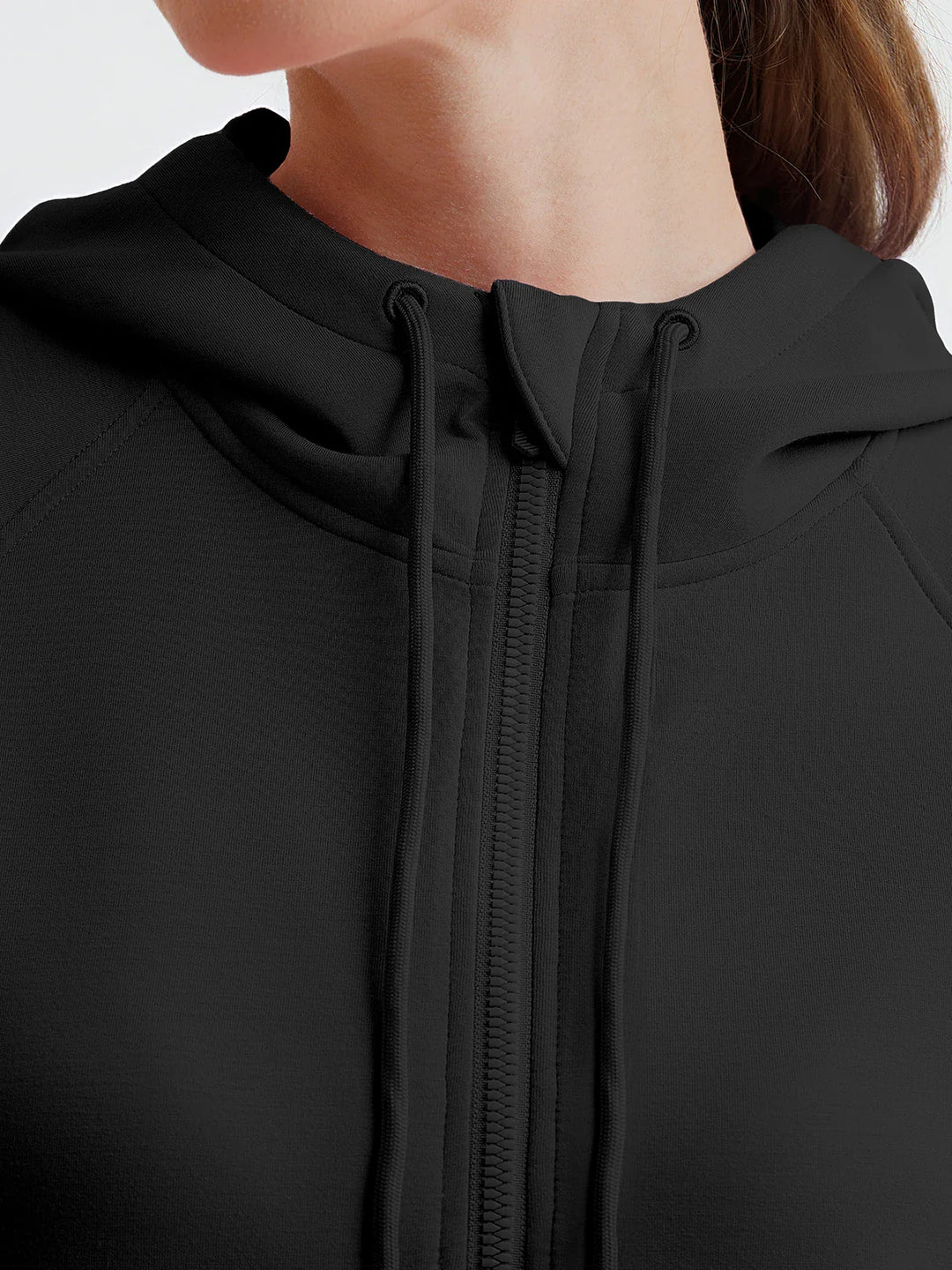 A model wearing a BRXL® Cropped Half-Zip Pullover Comfort Hoodie