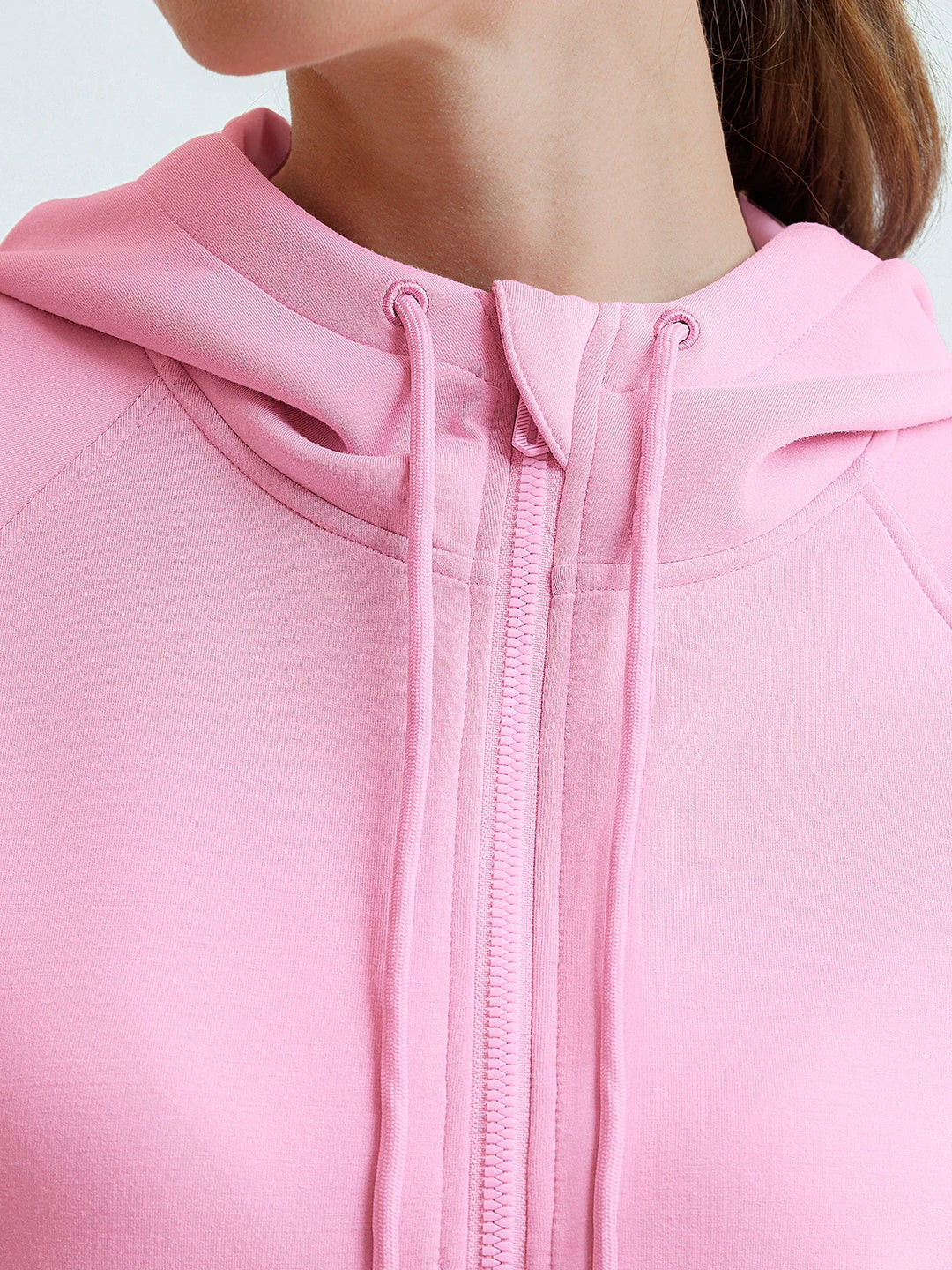 A model wearing a BRXL® Cropped Half-Zip Pullover Comfort Hoodie