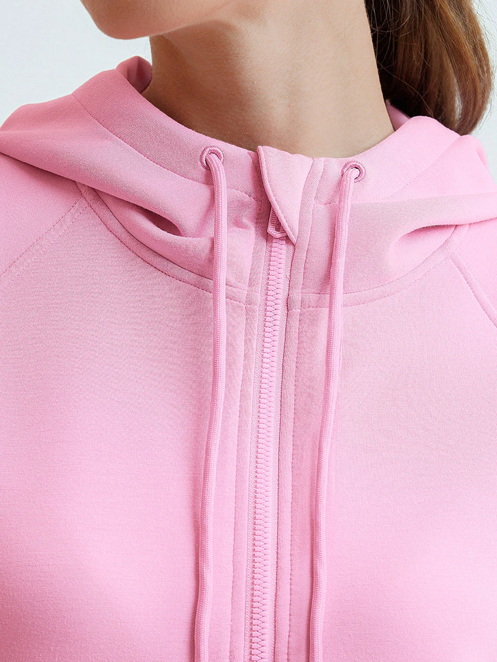 A model wearing a BRXL® Cropped Half-Zip Pullover Comfort Hoodie