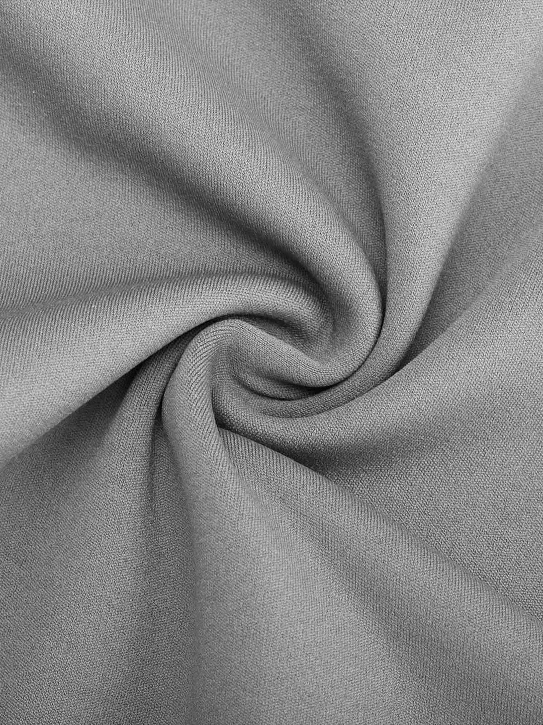 A model wearing a BRXL® Crossover Butt Lifting Side Pockets Running Leggings in