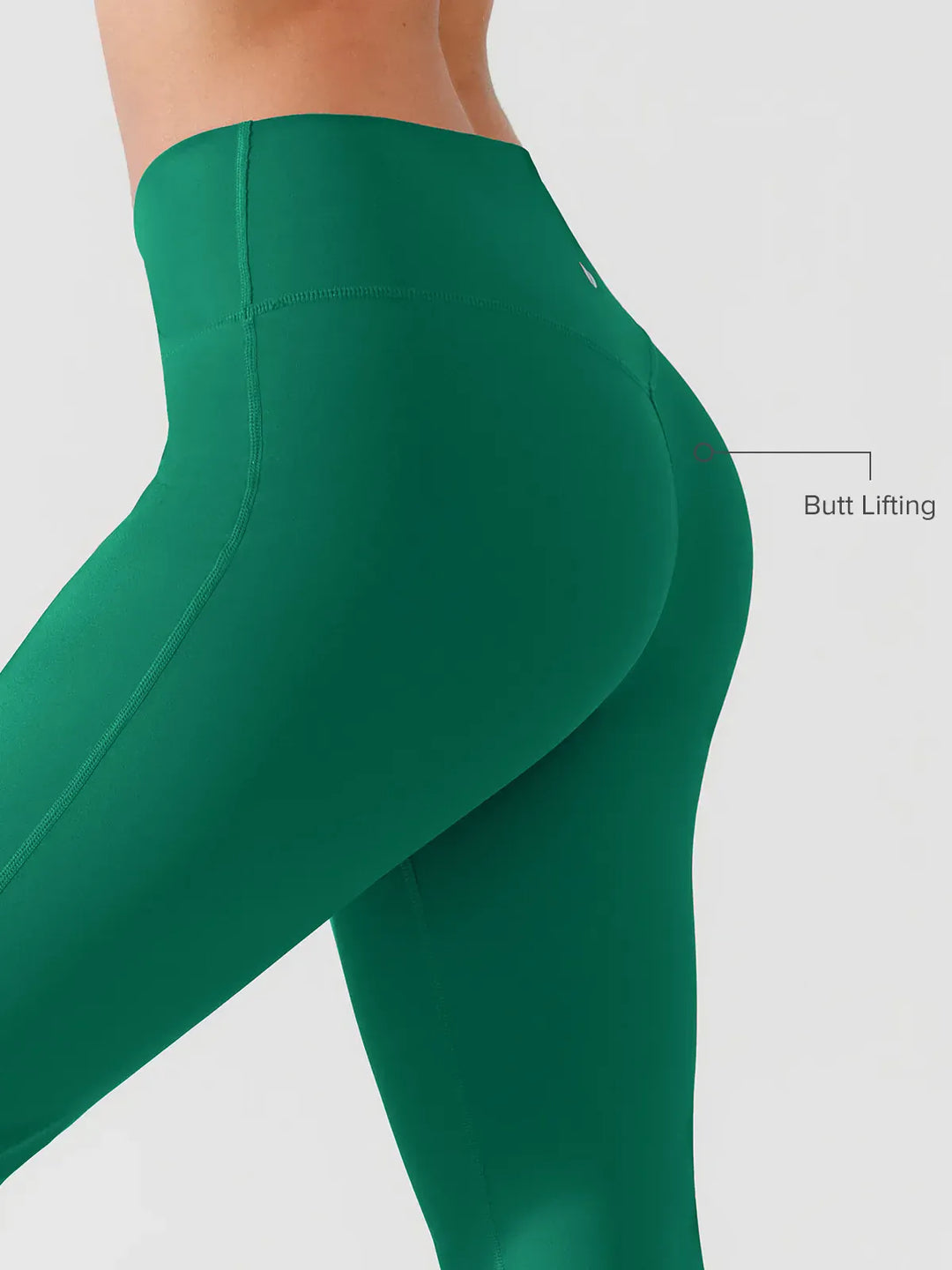 A model wearing a BRXL® Crossover Flared Yoga Pants in