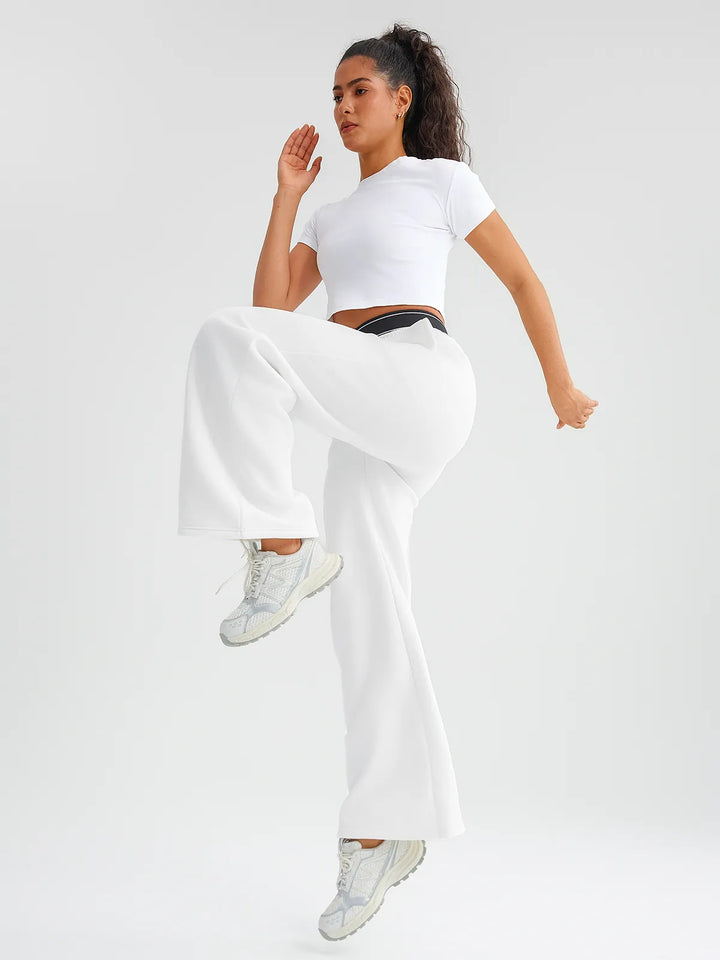 A model wearing a BRXL® Double Waistband Drawstring Mid-Rise Straight-Leg SweatPants