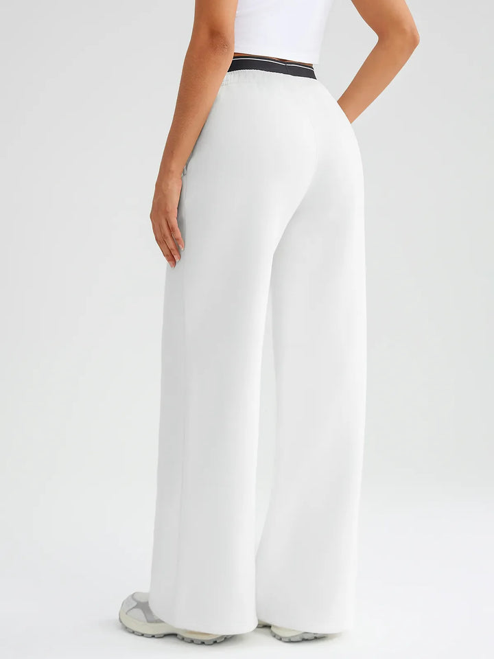 A model wearing a BRXL® Double Waistband Drawstring Mid-Rise Straight-Leg SweatPants