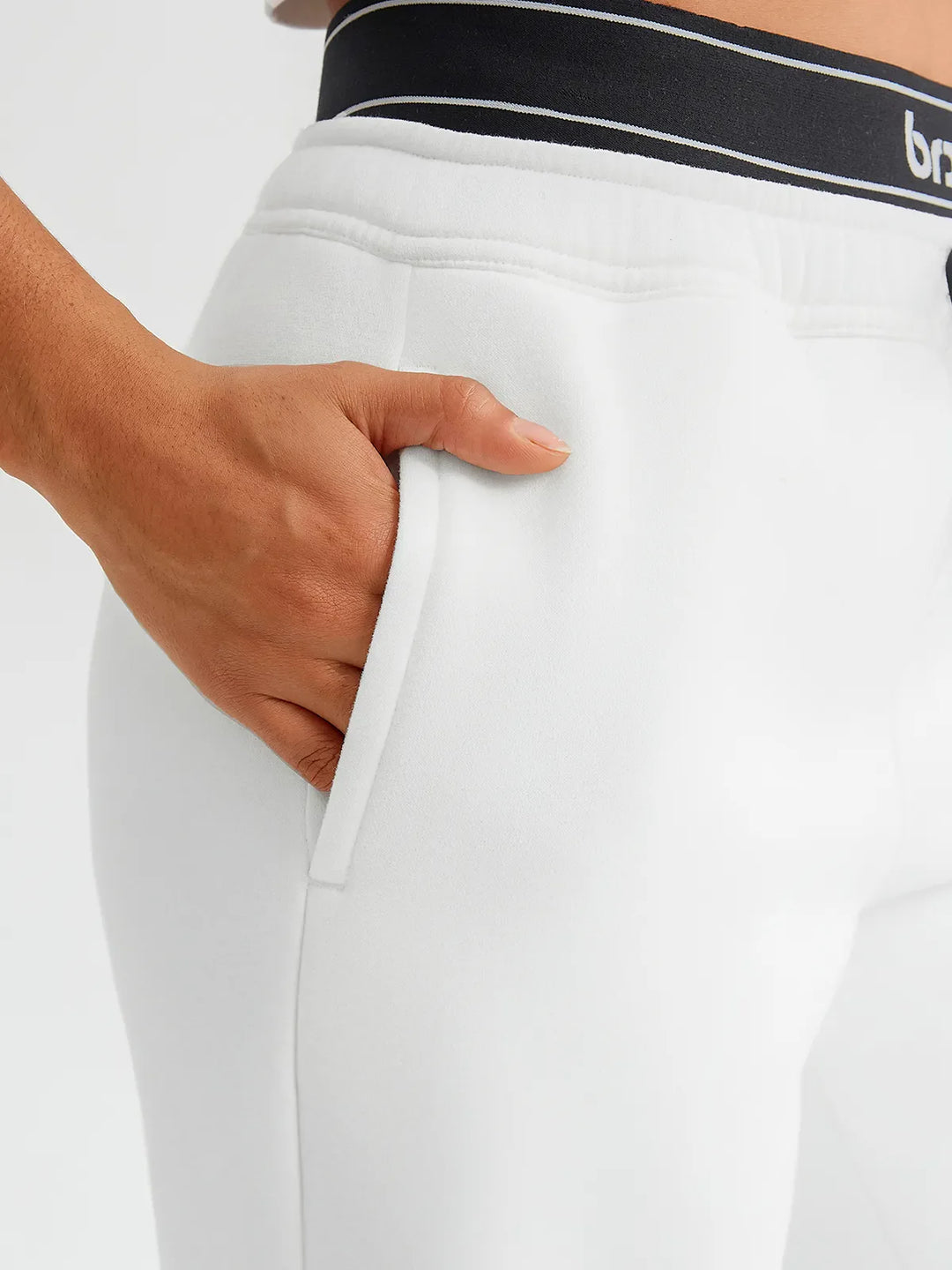 A model wearing a BRXL® Double Waistband Drawstring Mid-Rise Straight-Leg SweatPants