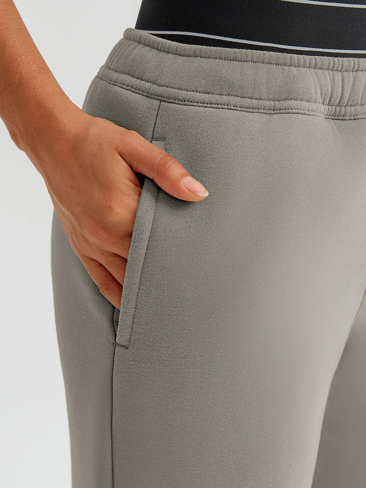 A model wearing a BRXL® Double Waistband Drawstring Mid-Rise Straight-Leg SweatPants