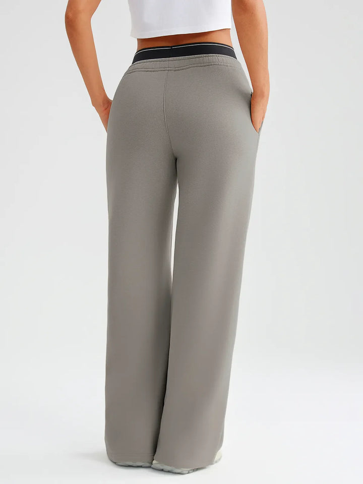 A model wearing a BRXL® Double Waistband Drawstring Mid-Rise Straight-Leg SweatPants