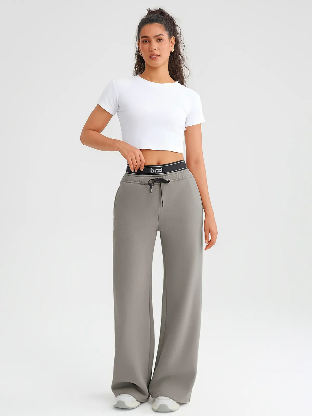 A model wearing a BRXL® Double Waistband Drawstring Mid-Rise Straight-Leg SweatPants