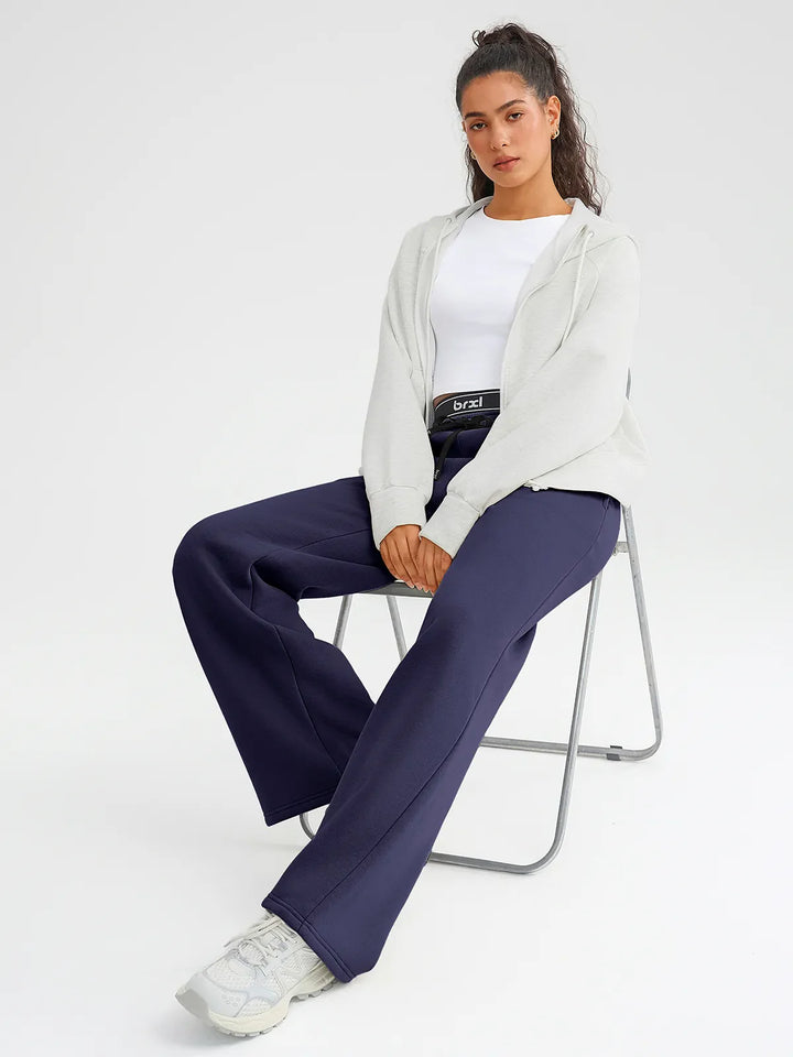 A model wearing a BRXL® Double Waistband Drawstring Mid-Rise Straight-Leg SweatPants