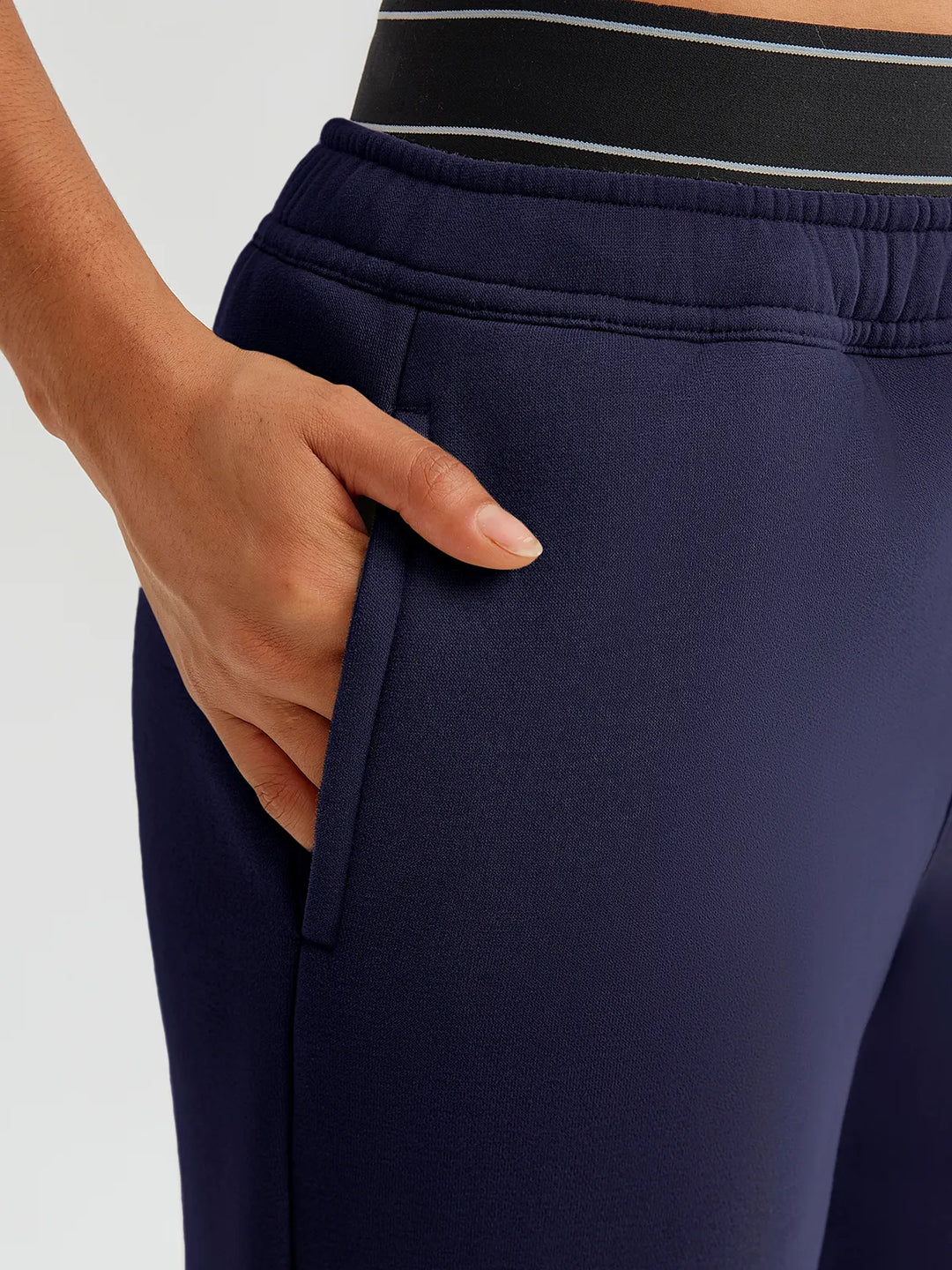 A model wearing a BRXL® Double Waistband Drawstring Mid-Rise Straight-Leg SweatPants