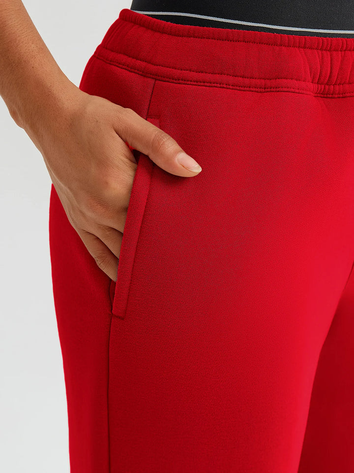 A model wearing a BRXL® Double Waistband Drawstring Mid-Rise Straight-Leg SweatPants