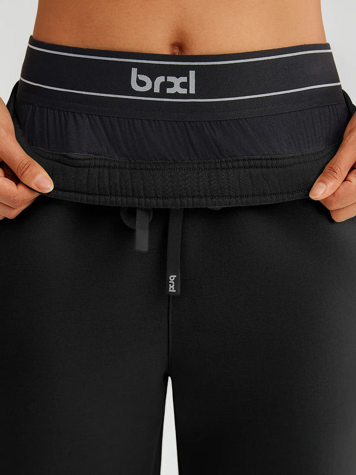 A model wearing a BRXL® Double Waistband Drawstring Mid-Rise Straight-Leg SweatPants