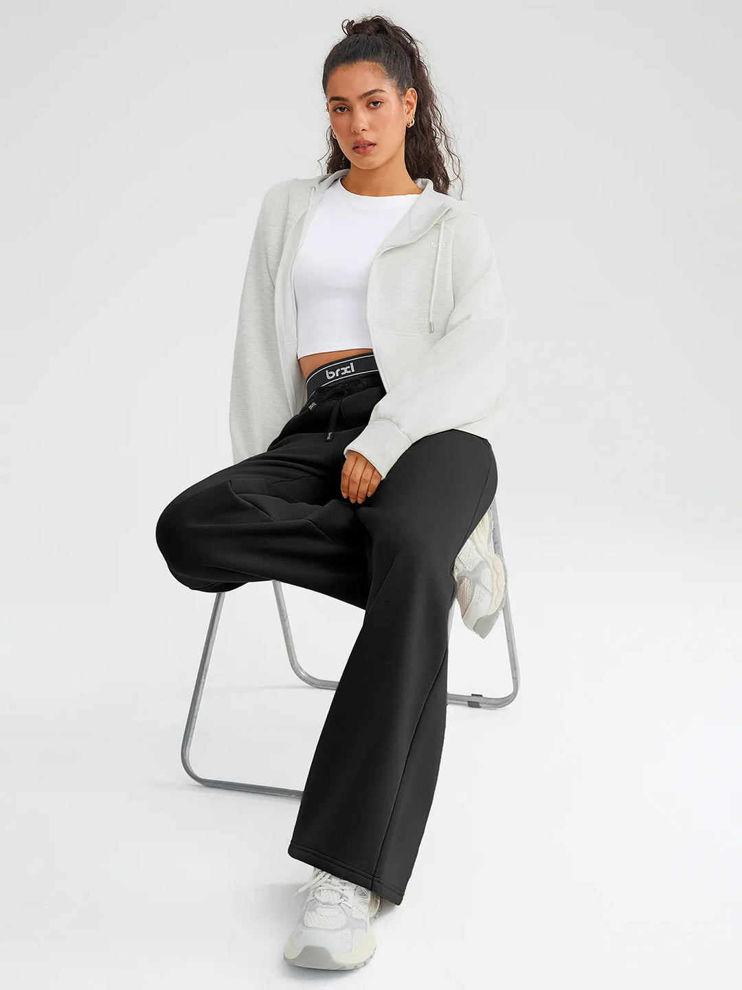 A model wearing a BRXL® Double Waistband Drawstring Mid-Rise Straight-Leg SweatPants