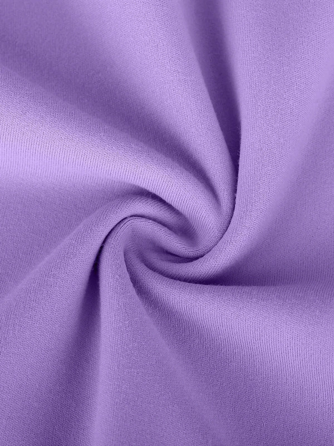 A model wearing a BRXL® Flow Y Racerback Bra with Low Cut and Spaghetti Straps in