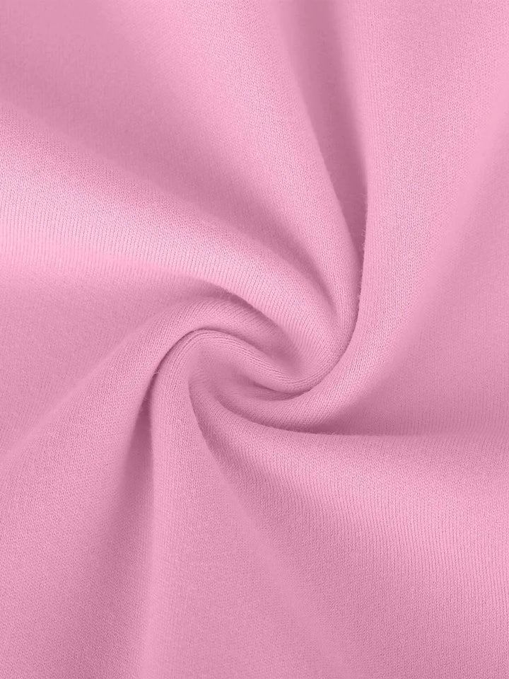 A model wearing a BRXL® Flow Y Racerback Bra with Low Cut and Spaghetti Straps in