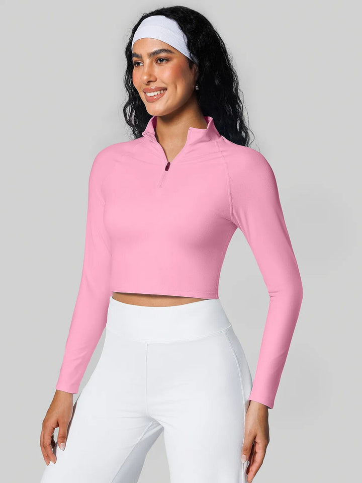 A model wearing a BRXL® Half Front Zipper Cropped Top Side Pockets Fleece Lined Leggings Set in