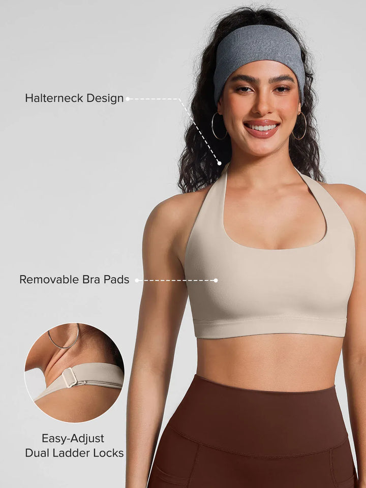 A model wearing a BRXL® Halter-neck Yoga Bra in
