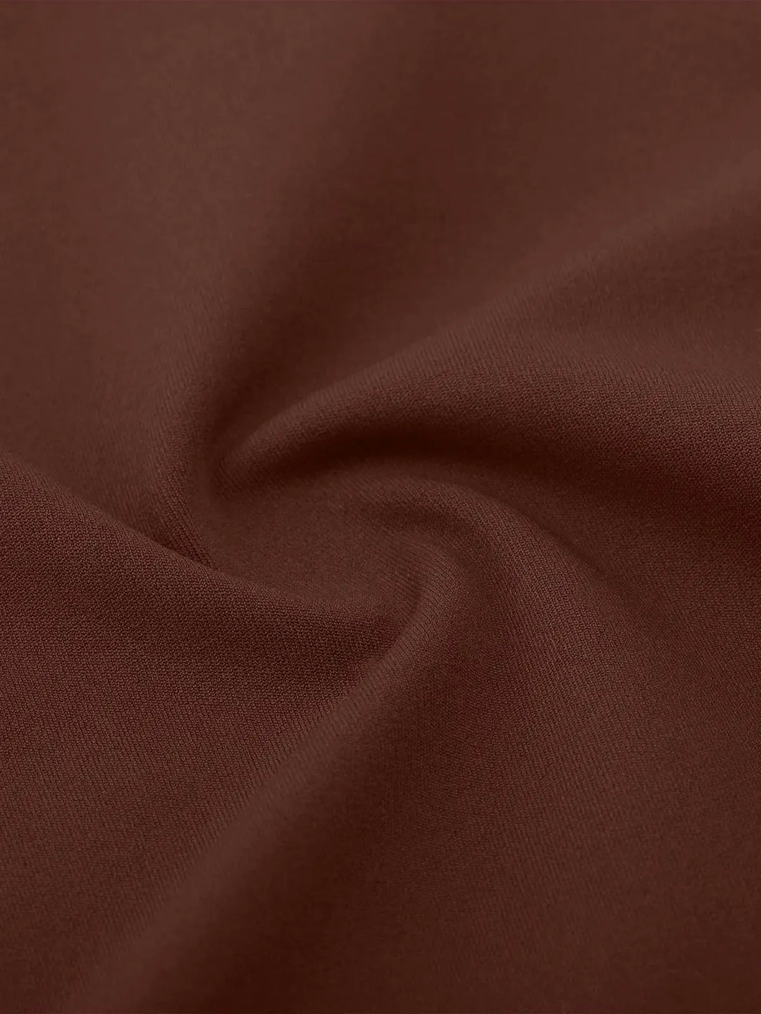 A model wearing a BRXL® High Rise Flared Side Pockets Scrunch Leggings in