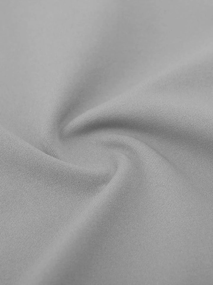 A model wearing a BRXL® High Rise Flared Side Pockets Scrunch Leggings in