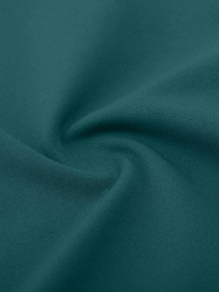 A model wearing a BRXL® High Rise Flared Side Pockets Scrunch Leggings