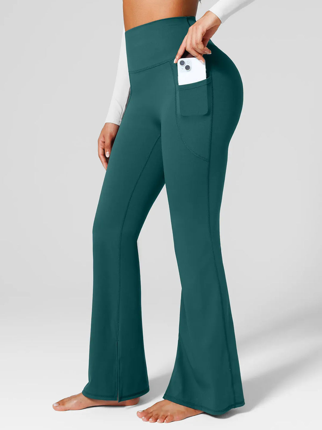A model wearing a BRXL® High Rise Flared Side Pockets Scrunch Leggings