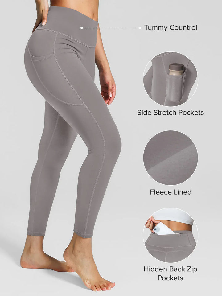 A model wearing a BRXL® High Rise Side Pockets Fleece Lined Leggings in