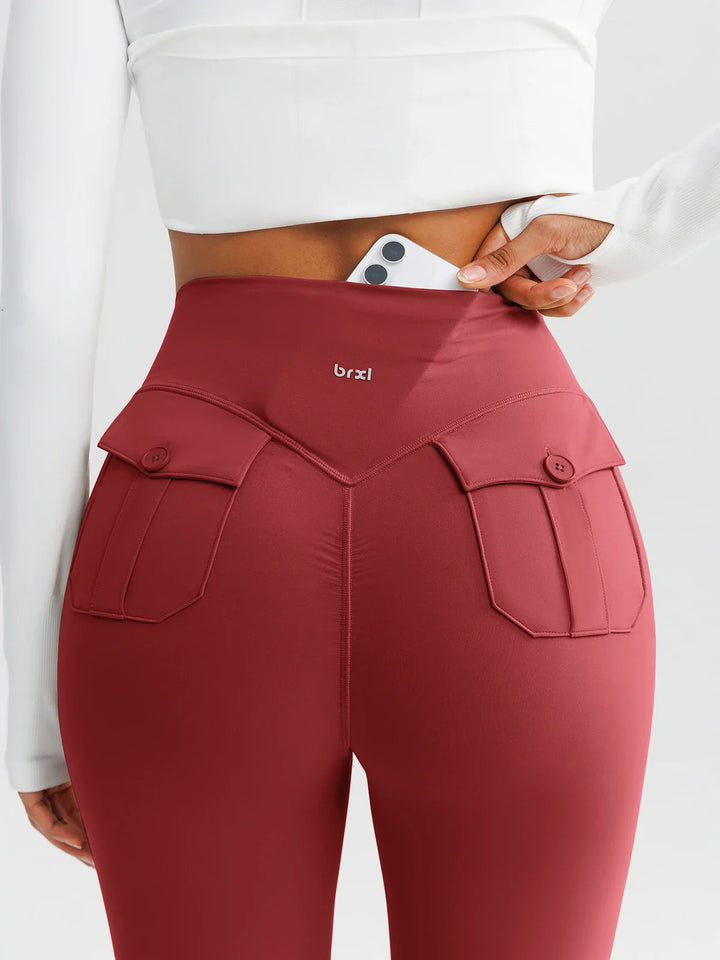 A model wearing a BRXL® High-Waisted Hidden Scrunch Leggings with Cargo Pockets