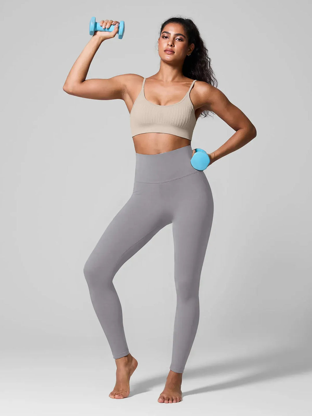 A model wearing a BRXL® High Waisted Seamless Triple layer Butt-Lifting Leggings With Tummy Control in