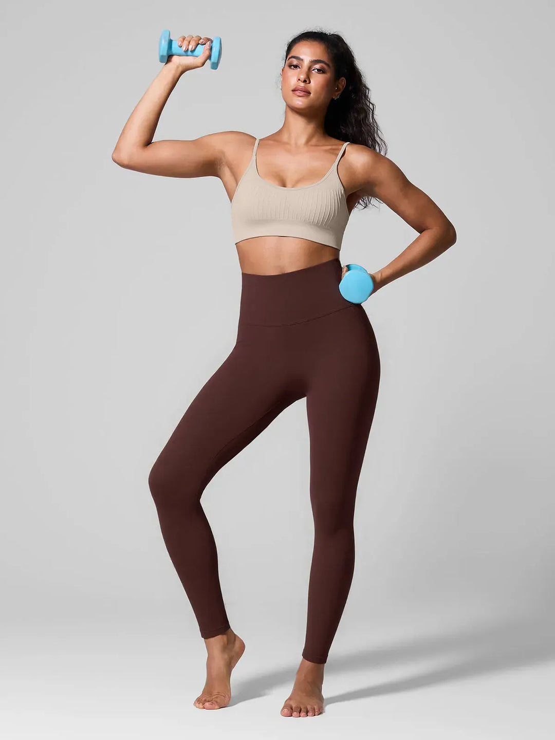 A model wearing a BRXL® High Waisted Seamless Triple layer Butt-Lifting Leggings With Tummy Control in