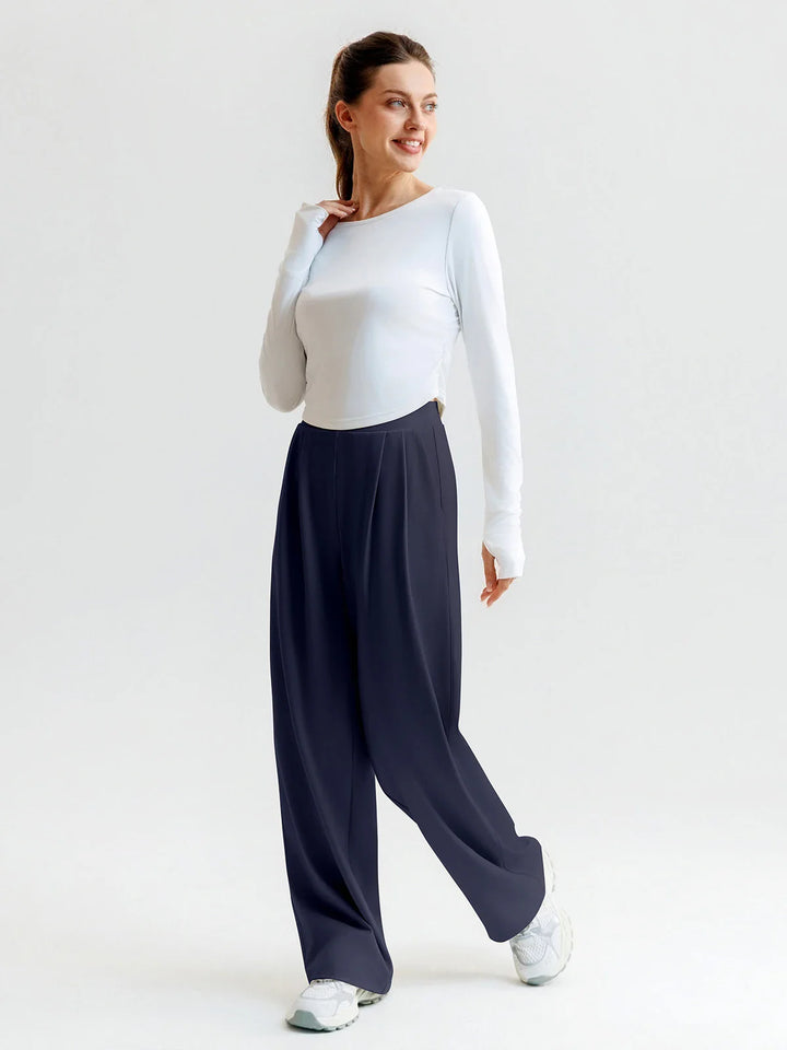 A model wearing a BRXL® High Waisted Straight Leg Commuter Pants With Pockets