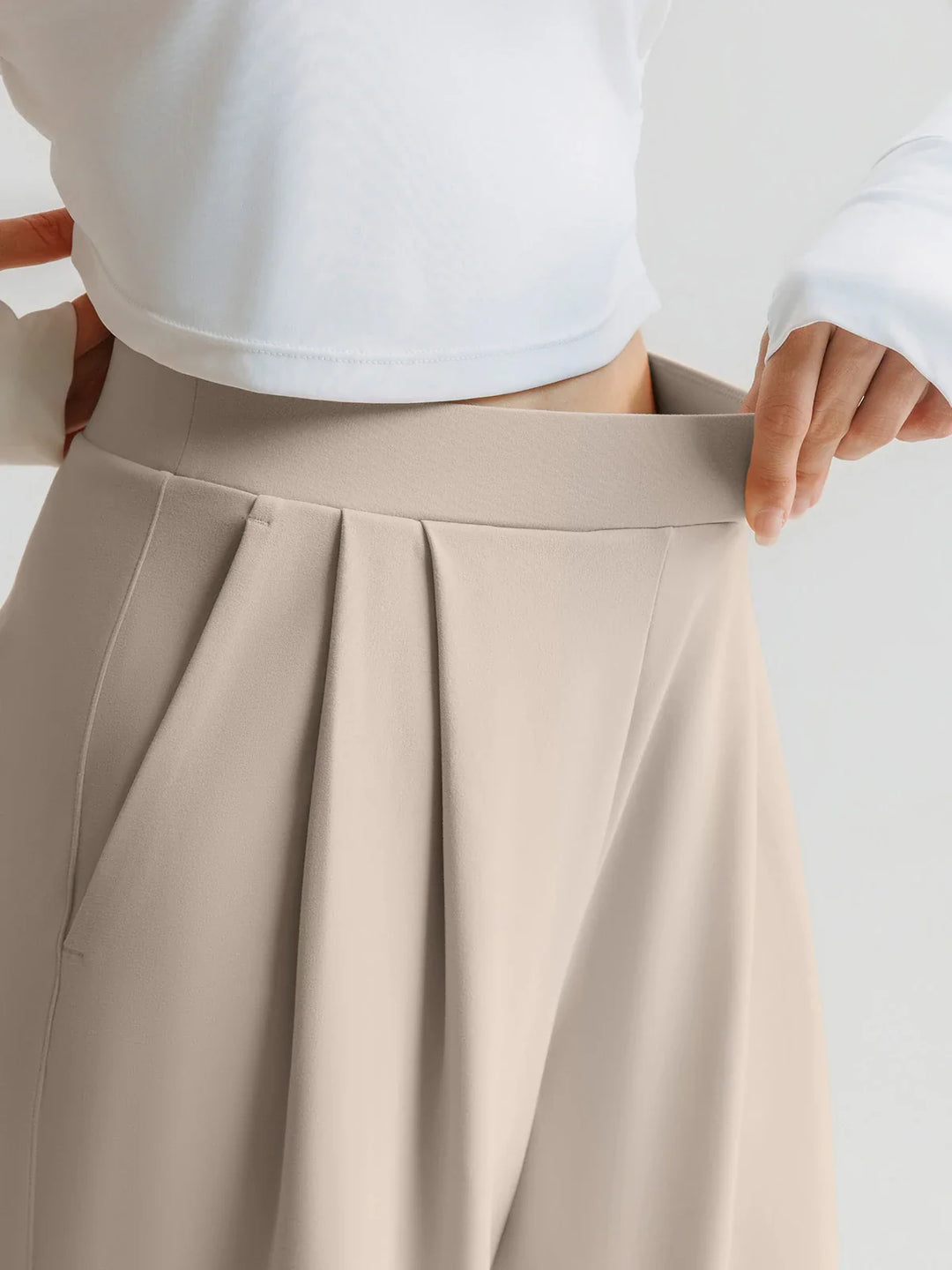 A model wearing a BRXL® High Waisted Straight Leg Commuter Pants With Pockets