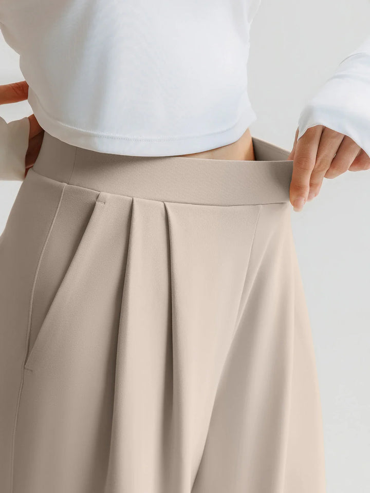 A model wearing a BRXL® High Waisted Straight Leg Commuter Pants With Pockets