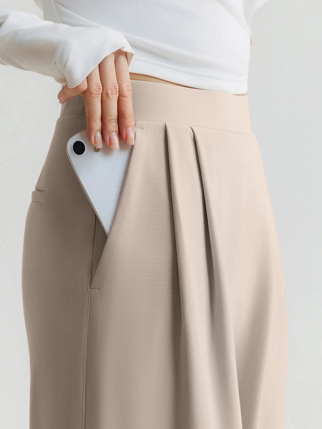 A model wearing a BRXL® High Waisted Straight Leg Commuter Pants With Pockets